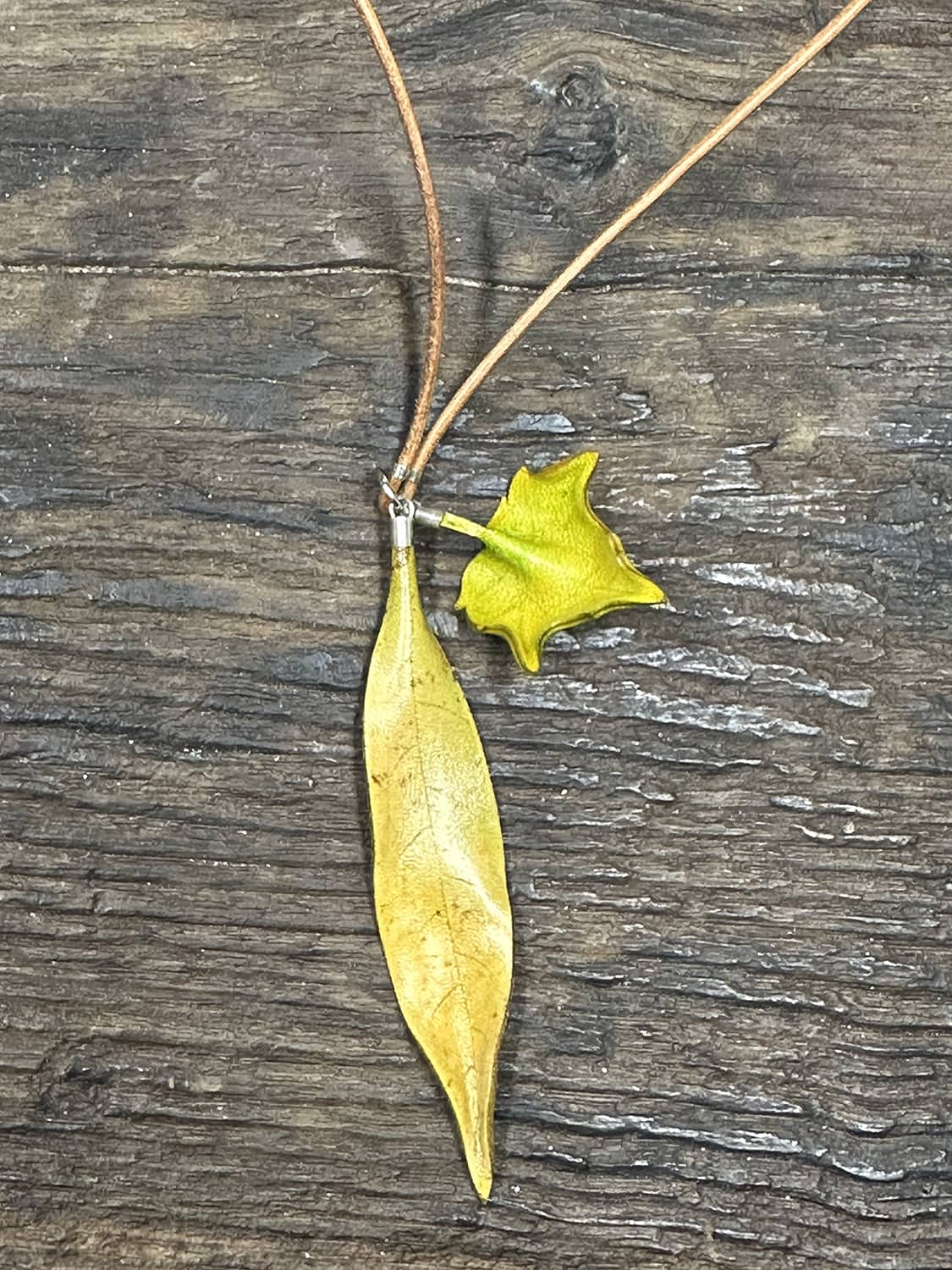 Leather double leaf pendant necklace