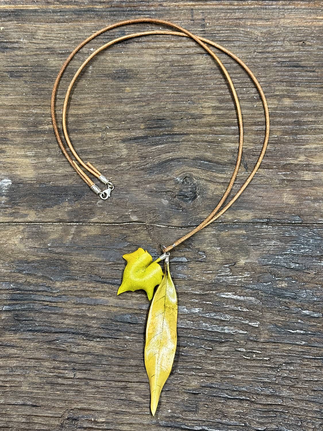 Leather double leaf pendant necklace